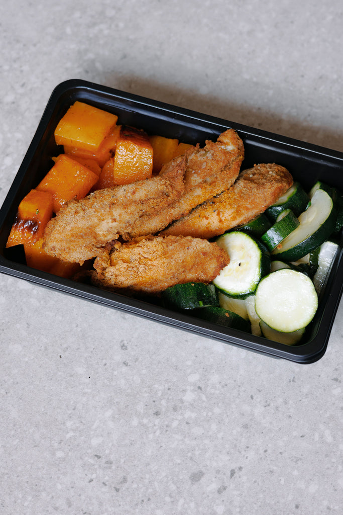 Crumbed Chicken Breast Tenders with Roasted Zucchini and Butternut