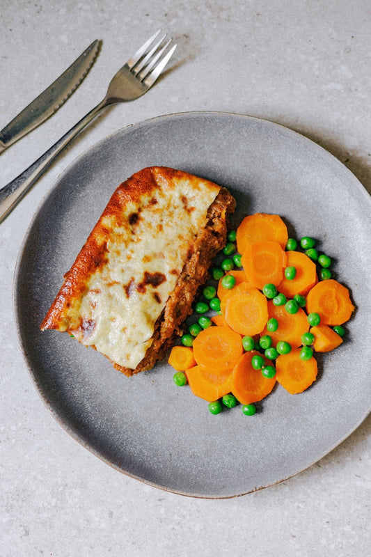 Beef Bobotie with Carrots and Peas - Plated Convenience