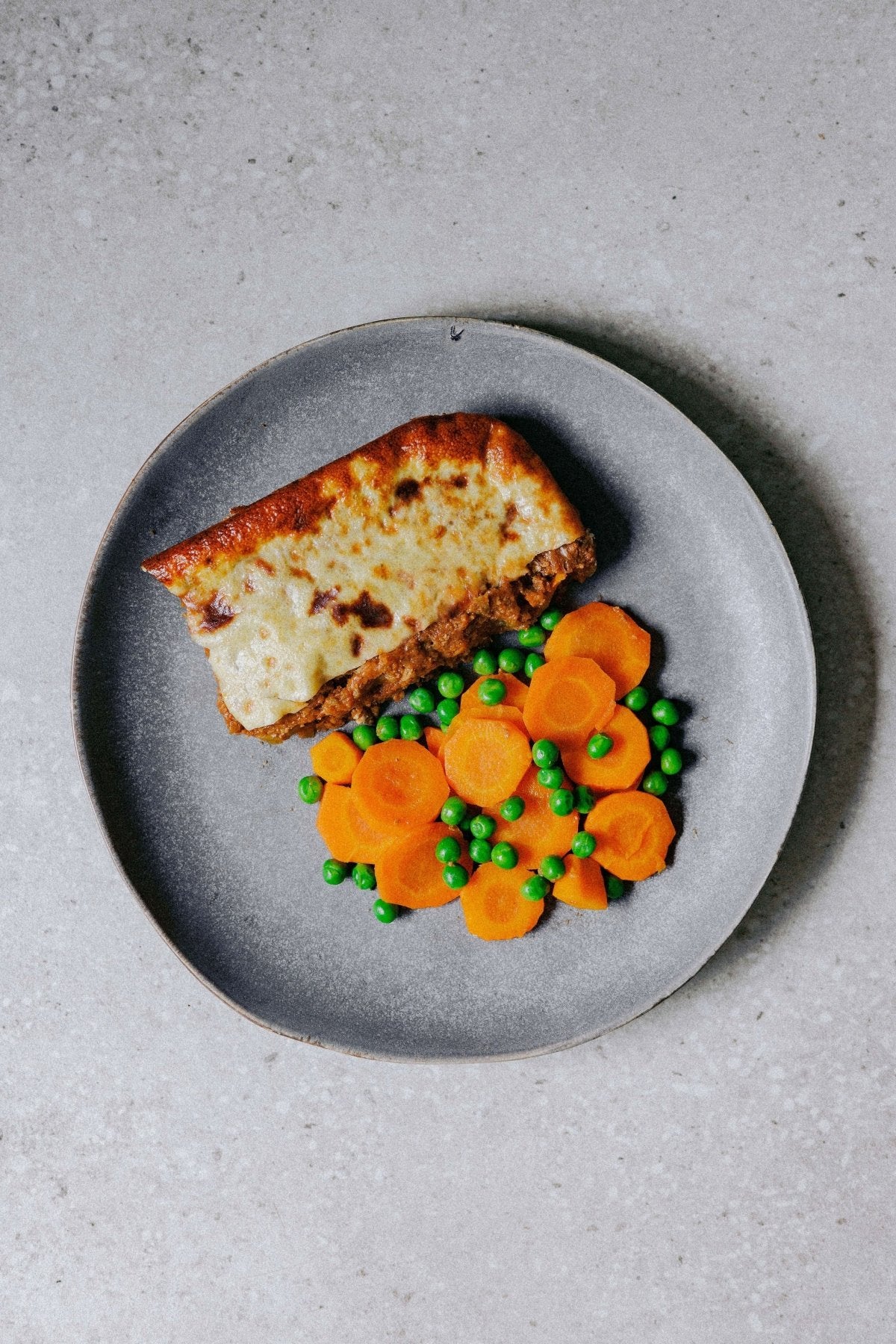 Beef Bobotie with Carrots and Peas - Plated Convenience