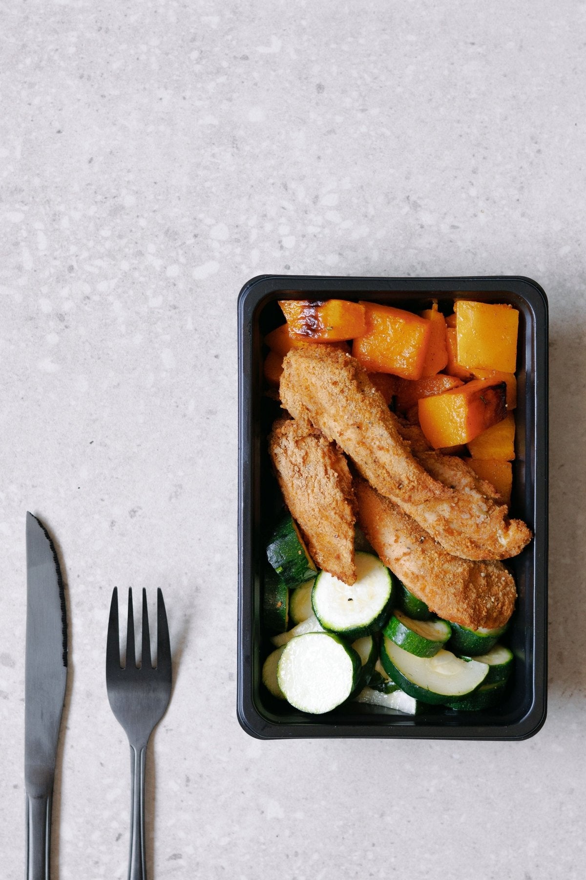Crumbed Chicken Breast Tenders with Roasted Zucchini and Butternut - Plated Convenience
