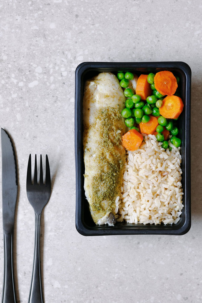 Steamed Hake Fillet with Brown Rice, Carrots and Peas - Plated Convenience